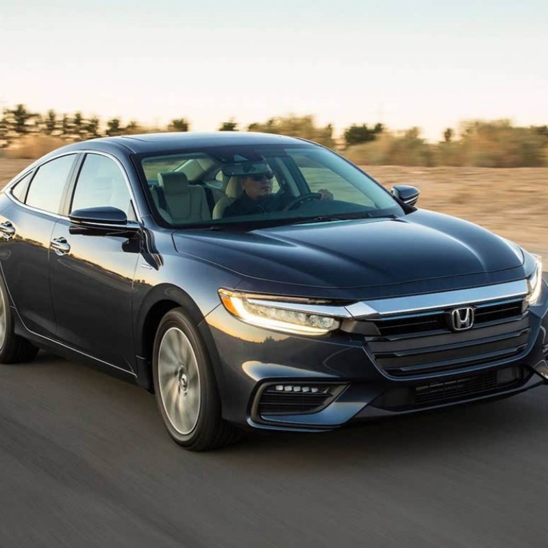 The Honda Fit is the ultimate urban compact car, offering exceptional fuel efficiency and surprising interior space in a small package. This versatile hatchback features Honda's renowned 1.5L i-VTEC e